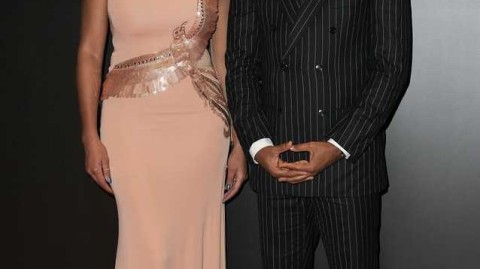 猎豹的柔情时刻：埃托奥与爱妻米兰亮相，回顾传奇生涯