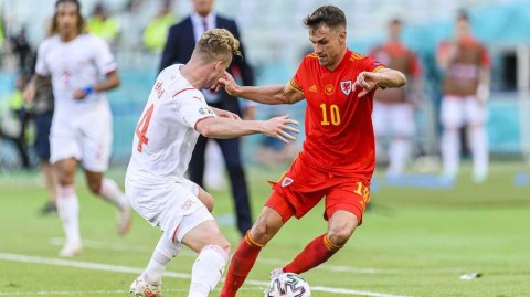 巴库之夜头球争锋，威尔士坚韧战平瑞士