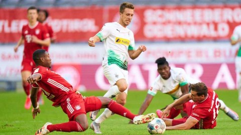 安联球场的戏剧之夜：拜仁慕尼黑险胜门兴，冠军触手可及